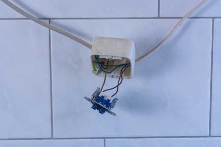 Electrical renovations in an old house. The installation of new power lines cable for power,...