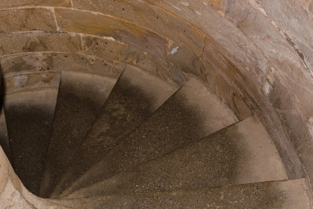 Thread staircase steps of a spiral staircase in a historic towerの写真素材