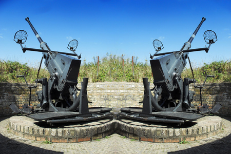 Two old anti-aircraft guns to defend against the Atlantic Wall in the Second World Warの写真素材