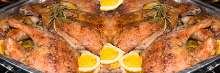 Crispy duck roast in an aluminum dish in the oven.の写真素材