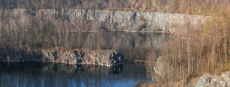 Panoramic view of an old open opencast mine of limestone works in Wuelfrath, Germany on a winter...
