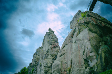 Beautiful rocky landscape with unique Mystic rock formation in a dramatic sky.の写真素材