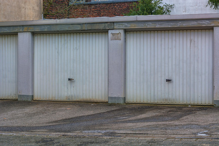 Car rows garages. Car garage with closed gates.
