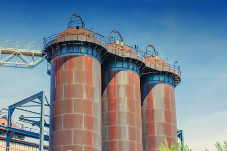 General view of an industrial plant refinery, consisting of pipes and towers of heavy industry.の写真素材