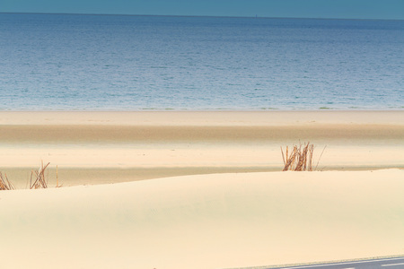 Beach impressions interplay of beach, sea and skyの写真素材