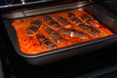 Fresh beef roulades braised in a dish in the oven.の写真素材
