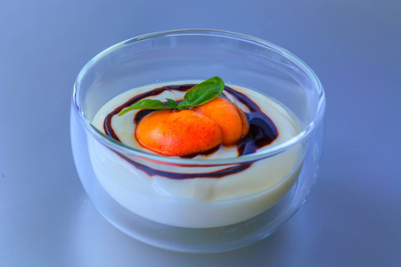 Dessert with fresh fruits and sweet fresh cheese.の写真素材