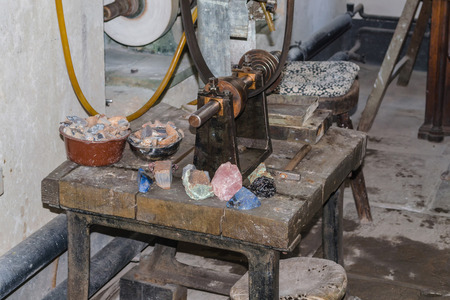 Old workbench with various tools and machines.のeditorial素材