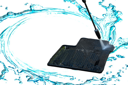 Close up cleaning of car mat with a pressure washerの写真素材