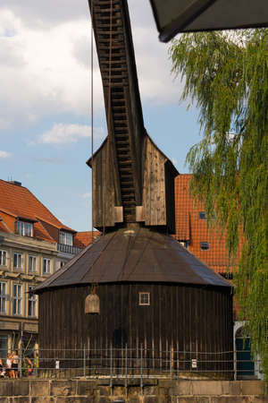 LUNNEBURG, LOWER SAXONY, GERMANY - JULY 27, 2018:Old harbor and crane in the historic center of Luneburg, Germanyのeditorial素材