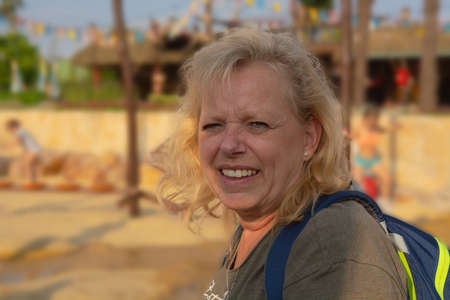 Senior in Nordic Walking Hiking on an autumn day