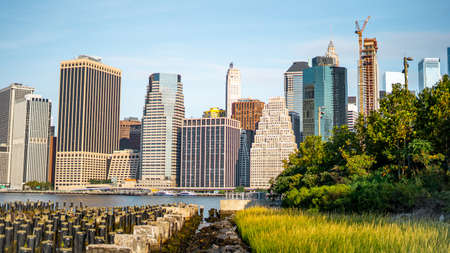 The view of Manhattan skyline and Brookyn bridge from Brooklyn side after sunrise , New york city , United States of Americaのeditorial素材
