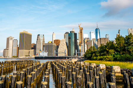 The view of Manhattan skyline and Brookyn bridge from Brooklyn side after sunrise , New york city , United States of Americaのeditorial素材