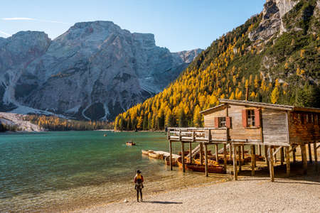 Nice view from Lago di braies . One of the most beautiful scenic lake in Dolomites late morning during Autumn seasonのeditorial素材