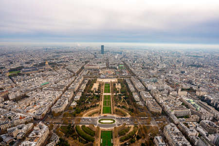 Panoramic view of Paris from the top of Eiffel tower during Autumn season in the afternoon cloudy day . One of the most important viewpoints of Eiffel in  the heart of Paris, Franceのeditorial素材