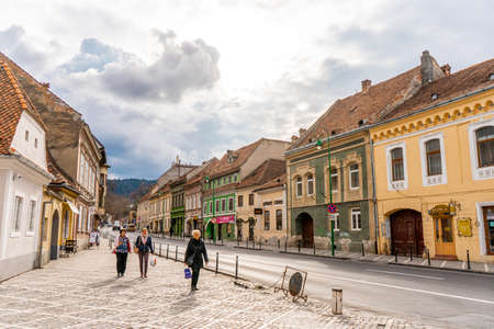 Brasov Republicii street and Council square in the evening during spring season. The most important street and square in the heart of Brasovのeditorial素材