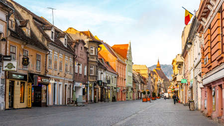 Brasov Republicii street and Council square in the evening during spring season . The most important...