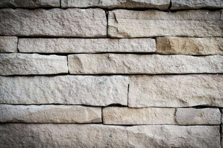 Stacked stone wall, background and texture.の写真素材