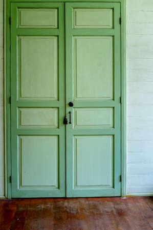 Classic wooden gateway with 2 doors.の写真素材