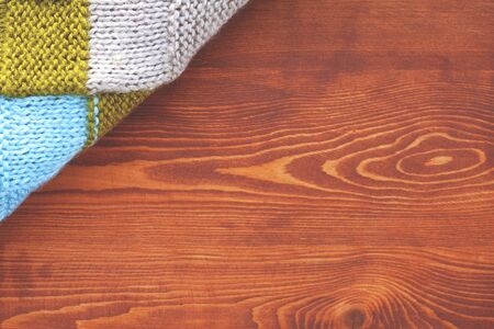 beautiful waxed wooden background with scarf side view. flat lay top view close-up