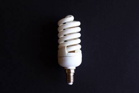 energy saving light bulb lamp on black background close-upの写真素材