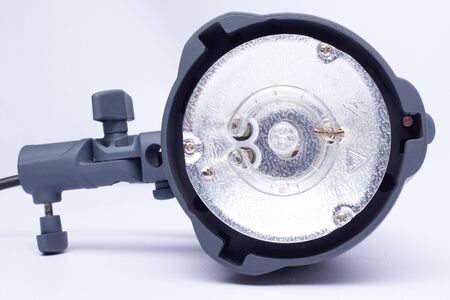 pulsed light. studio flash on a white background closeup