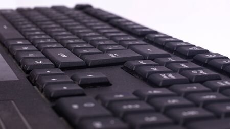 black keyboard for messaging and writing text on a computerの写真素材