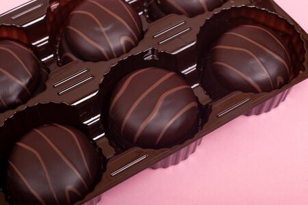 chocolate chip cookies on a pink background. yummy sugary  chocolate sweets.
