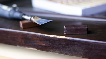 sealing scratches and chips on a wooden surface, wax pencils and tools for furniture and laminate...