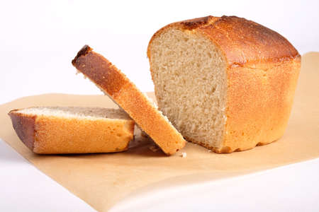 sliced golden crispy bread baked in the oven close up.