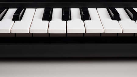 midi keyboard synthesizer, piano keys closeup