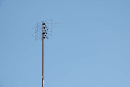 TV antenna against the sky with copy space.