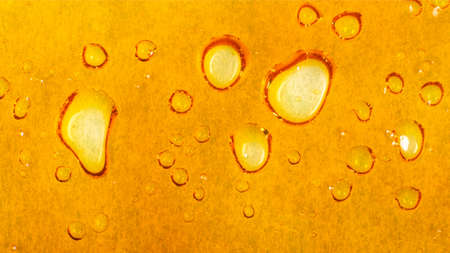 texture gold wax cannabis, marijuanna dab background.