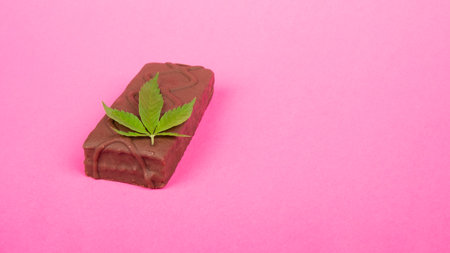 cannabis sweet food candy on pink background with copy space.の写真素材
