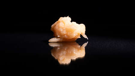 hashish cannabis wax on black backgroundの写真素材