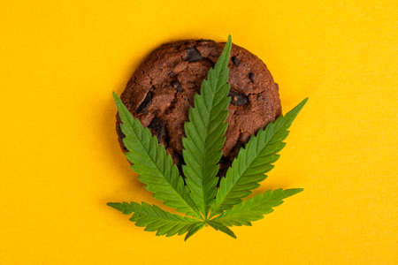 chocolate chip cookies with THC and cannabis leaf.の写真素材