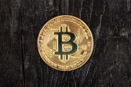 bitcoin coin on a dark background closeupの写真素材