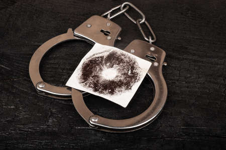 punishment for hallucinogenic mushrooms, handcuffs and mushroom printの写真素材