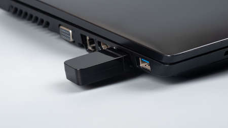 optional removable router to enhance the signal on a laptopの写真素材