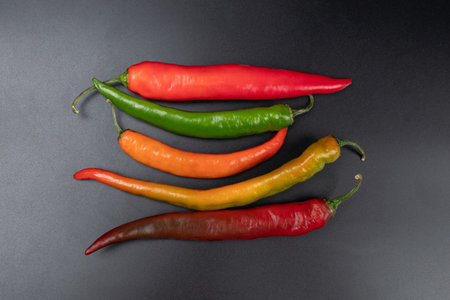 spicy asorti chili peppers green and red colorの写真素材
