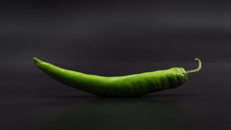 green chili pepper on a gray backgroundの写真素材