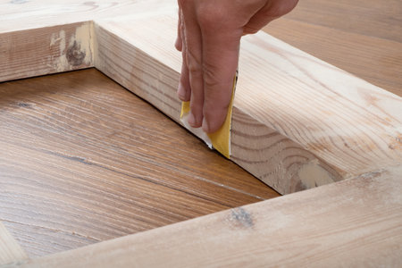 grouting sanding doors with sandpaper, door restoration.の写真素材