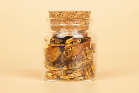 dried fly agaric in a jar for the microdosing use closeup, hack mind mushrooms.の写真素材