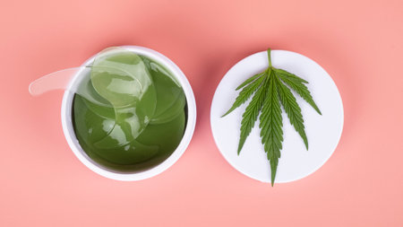 medical marijuana eye patches on pink background,cannabis cosmetic beauty skin care.の写真素材
