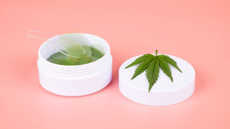 medical marijuana eye patches on pink background,cannabis cosmetic beauty skin care.の写真素材