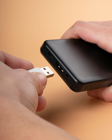 hand connect usb for black portable power bank charger.の写真素材