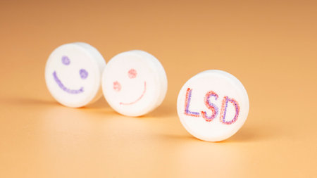 blue and red LSD pills , psychedelic drug for the treatment of severe stages of depression.の写真素材