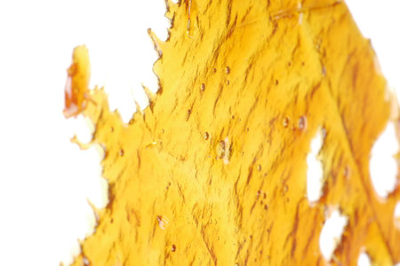 gold cannabis resin extract, yellow wax rosin.の写真素材