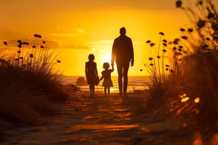silhouettes of parents with a child walking on the evening beach generative ai.の素材