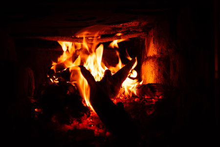 burning wood in the stove, flame charcoal.